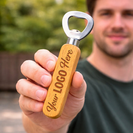 Laser engraved wood bottle opener with company logo in use